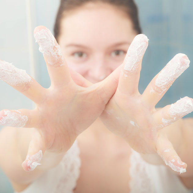 photodune-15410598-woman-with-moisturizing-skin-cream-skincare-s